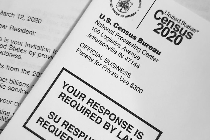 photo-1584748452591-640305621fc5 Census forms.